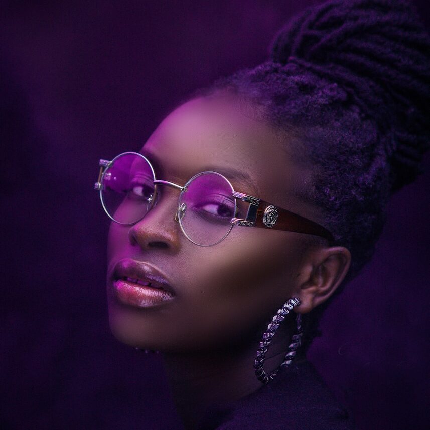 woman in silver framed eyeglasses