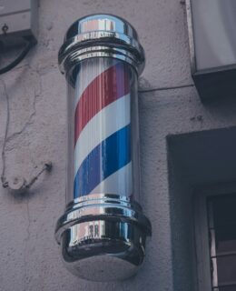 barber's poll on gray wall
