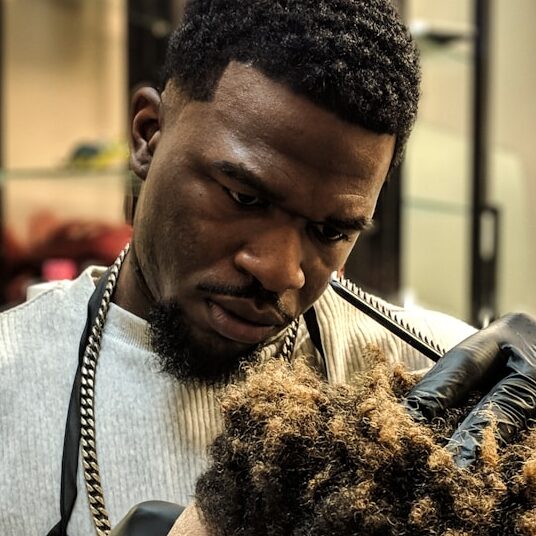man cutting hair man