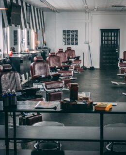 brown leather barber chairs in room